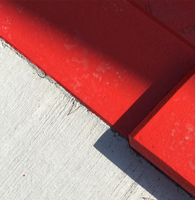 Comme Un Trait architecte d'intérieur LE MANS SARTHE Pays de la Loire aménagement paysager espace land art couleur rouge béton balayé voile béton